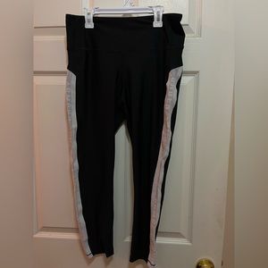 Great workout leggings. Under Armor brand. White sheet on sides of legs.